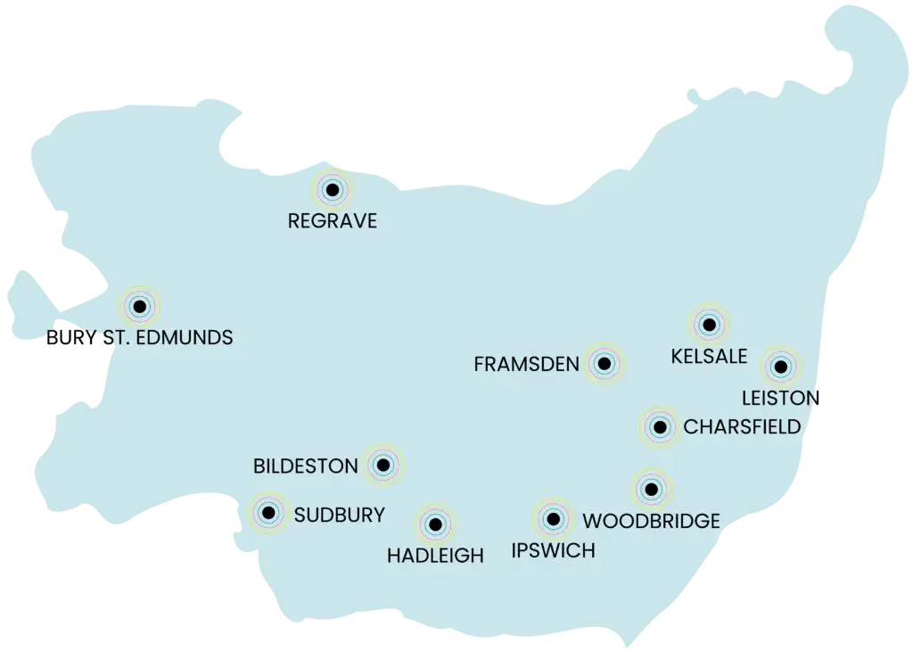 Map of Suffolk highlighting towns with community energy initiatives, including Thelnetham, Hinderclay, Ixworth, Debenham, Bildeston, Hadleigh, Charsfield, Kelsale, Leiston, and Woodbridge.